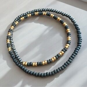 Elegant Handmade Beaded Dark Grey Wrap Bracelet with Gold Accents